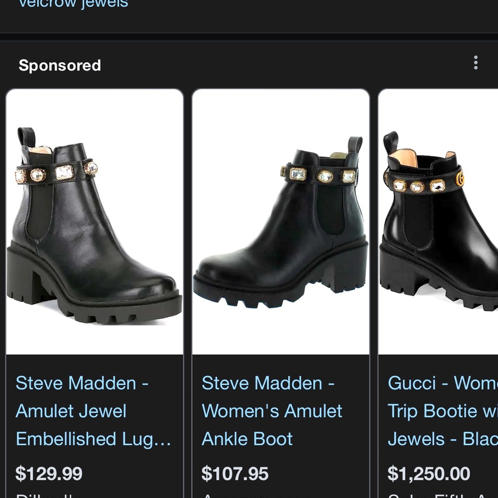 Steve madden Gucci doop black low top heeled boot with jewels lining the top.